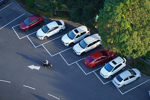 An aerial view of parked vehicles