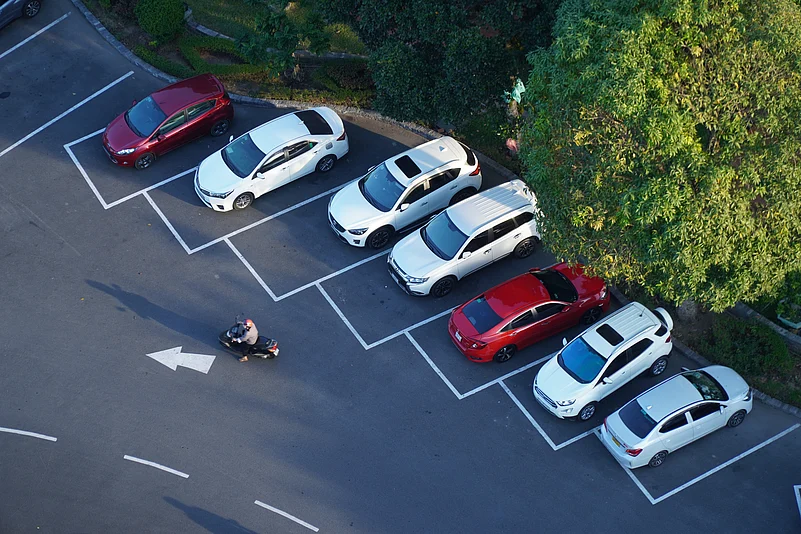 An aerial view of parked vehicles