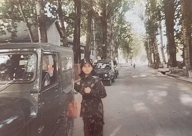 Copyright: Major (Dr) Madhu Mishra : Major (Dr) Madhu Mishra surrounded by chinar trees in Kashmir