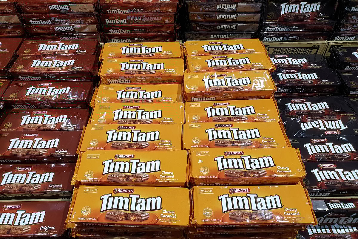 Tim Tams are a crunchy biscuit with creamy filling and a rich chocolate coating