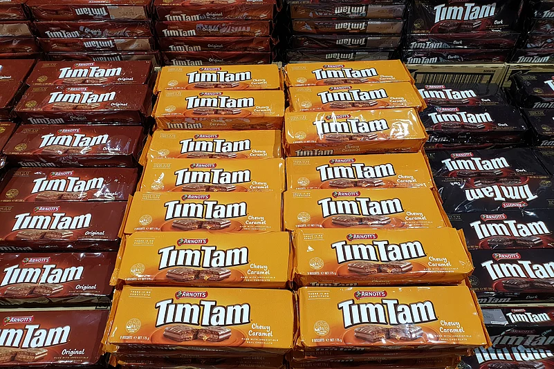 Tim Tams are a crunchy biscuit with creamy filling and a rich chocolate coating