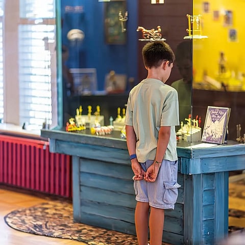 A child looks at an exhibit at the İstanbul Toy Museum