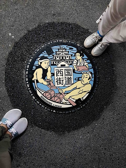 A painted manhole on the roads of Hiroshima