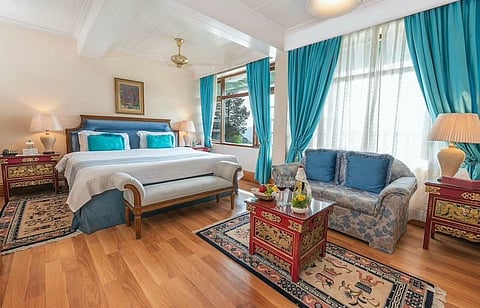 The hotel features 25 deluxe rooms and suites offering magnificent views of the Himalayas