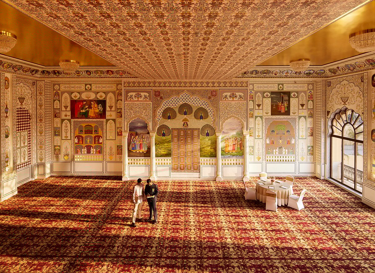 Explore hand-painted murals and mosaics in the Rang Mahal ballroom