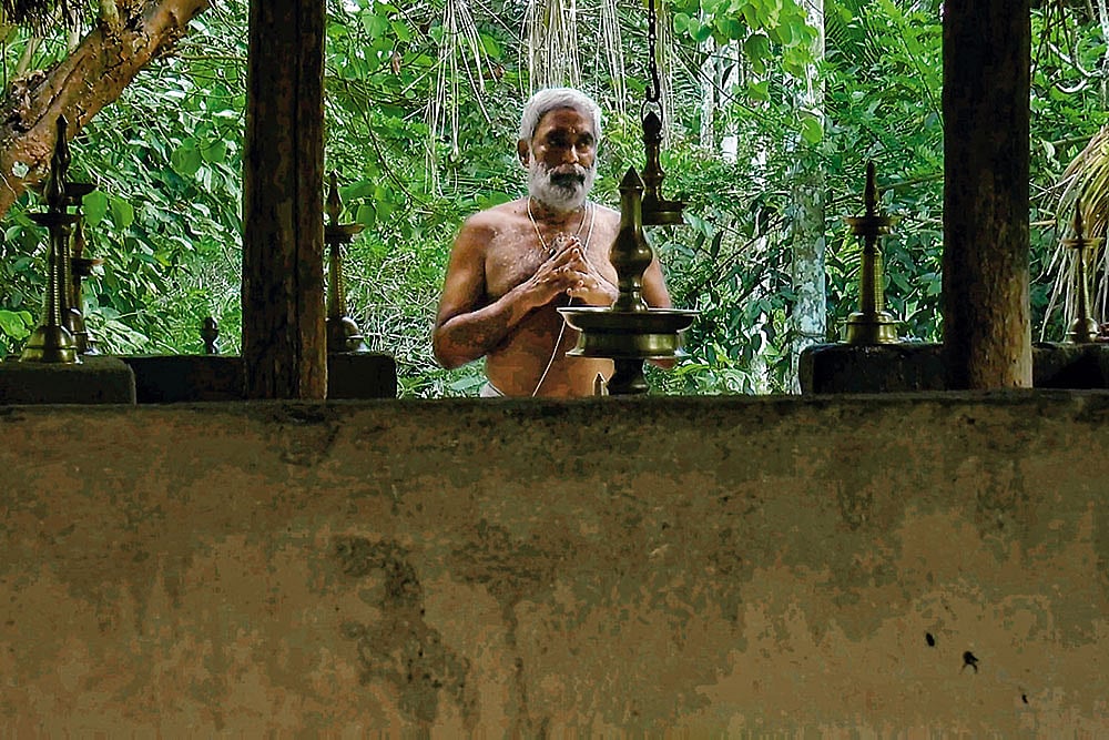 A devotee praying at the Valmiki Ashram