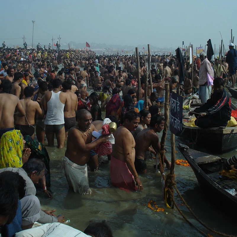 People bathing at Sangam during Kumbh.