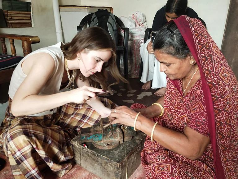 Kamlesh Sharma taking a Tarkashi workshop. - Mohan Lal Sharma