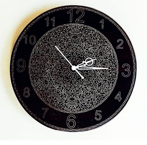 A Tarkashi wall clock.
