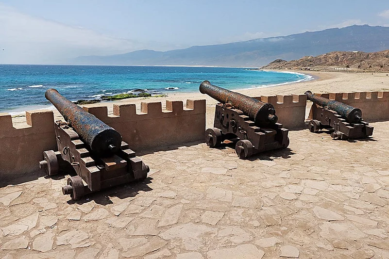 Military cannons at Omans Mirbat Fort overlooking the sea