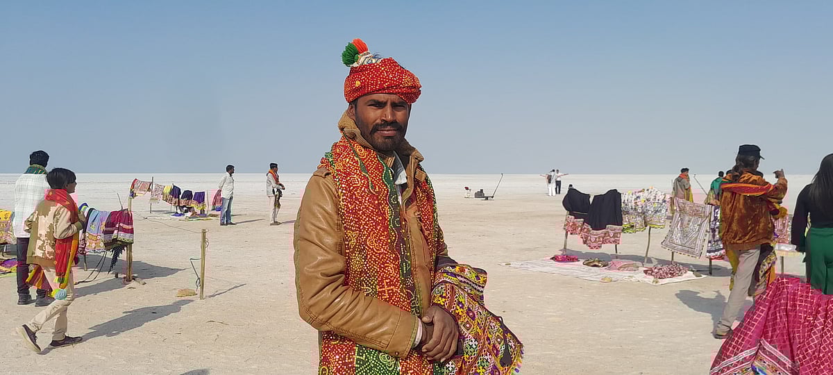 Locals selling colourful Chaniya Cholis along the heavenly road.