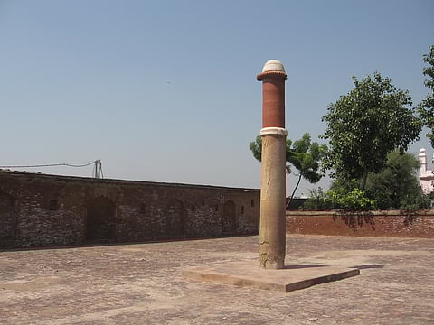 The pillar at Fatehabad, inside another complex that dates to the Tughlak era.