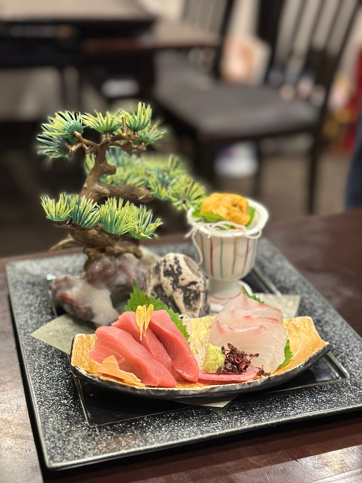 When in Ginza, try local delicacies like Sashimi.