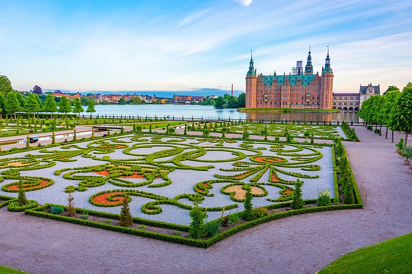 The baroque-style gardens that surround the Frederiksborg Castle in Denmark.