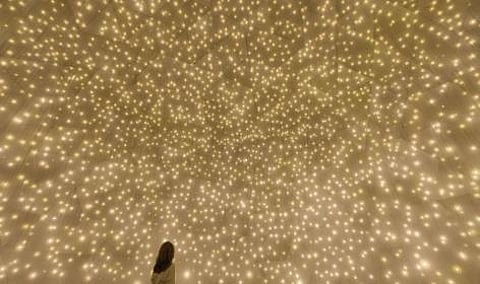 In "Massless Suns and Dark Suns," spheres of light and darkness converge to challenge perceptions of reality.