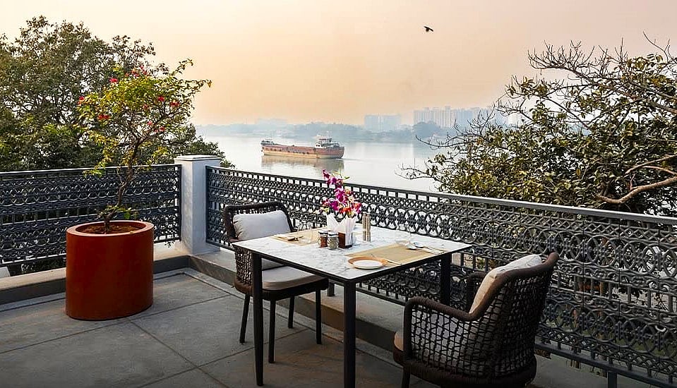 Enjoy a meal at the outdoor terrace with stunning views of the river.