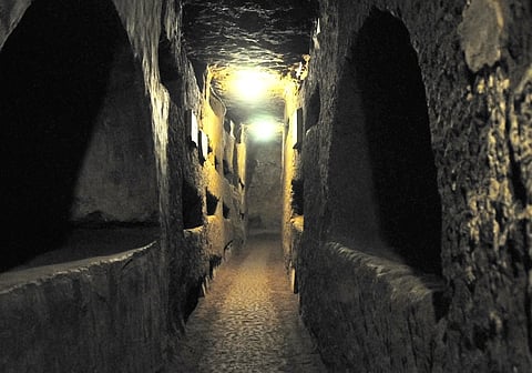 Beneath the city's streets lies a network of ancient catacombs.