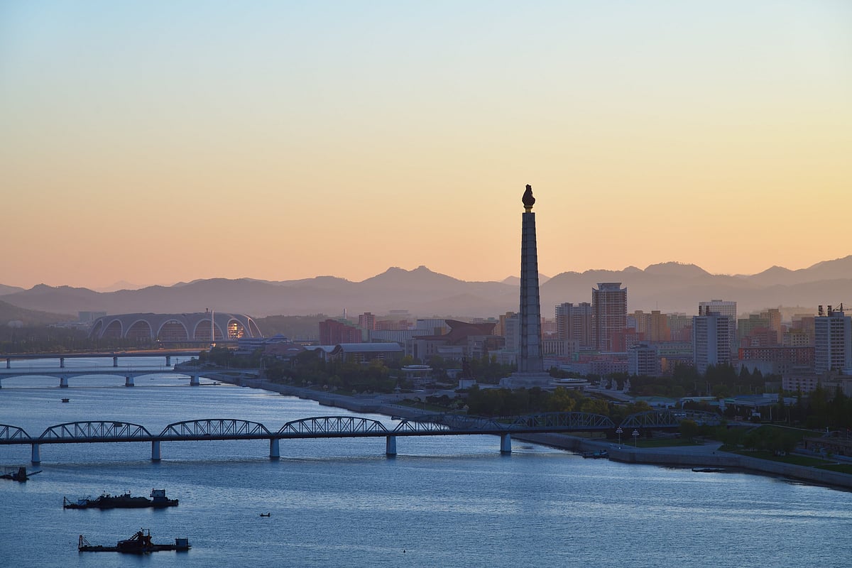 Sunrise over the Taedong River in Pyongyang, North Korea - znm/Shutterstock