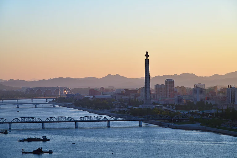 Sunrise over the Taedong River in Pyongyang, North Korea - znm/Shutterstock
