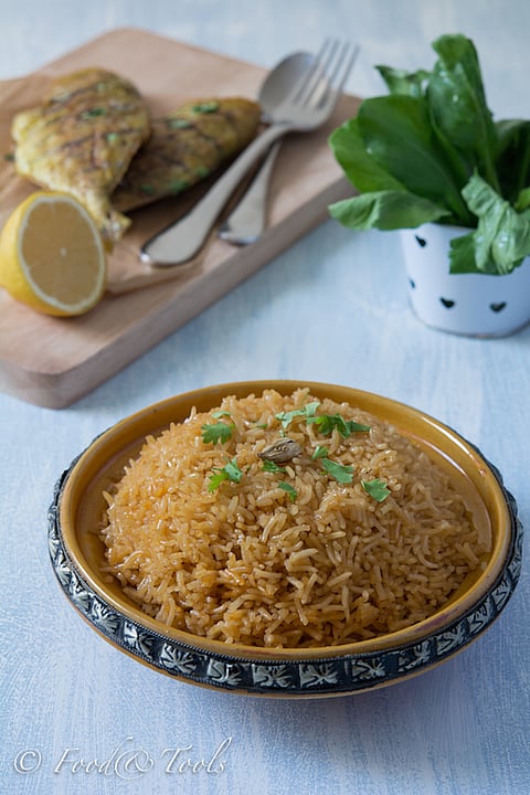 Muhammarf served with grilled fish and greens 