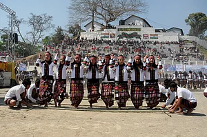 Prem Singh Kanwar/Wikimedia Commons : The artists performing a dance ‘Cheraw Kanpui’ during the inauguration of the Chapchar Kut