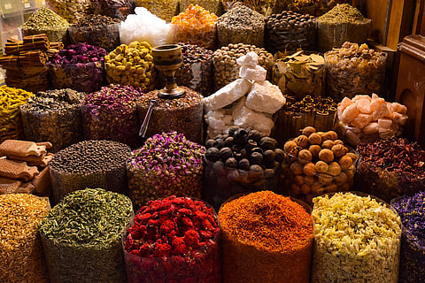 Pick up spices at a souk in Bahrain