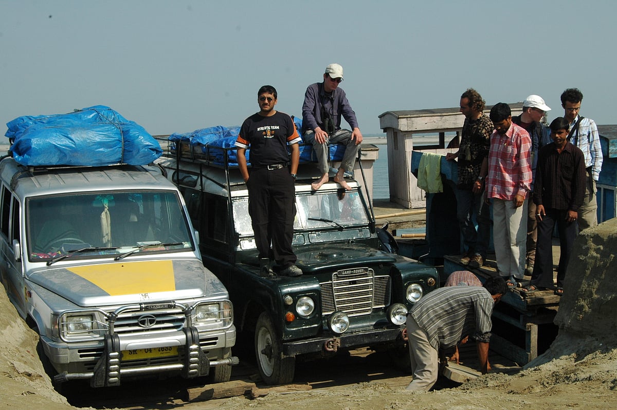 Law with his Land Rover cross the Brahmaputra by ferry