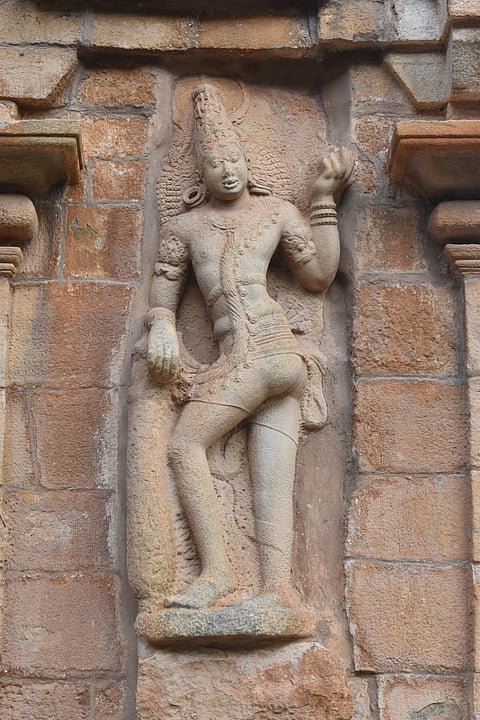 A carving of Vishnu on one of the temples in Narthamalai