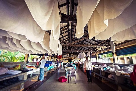 Dhoby Khana is a historic public laundry run by the Tamil Vannan community.