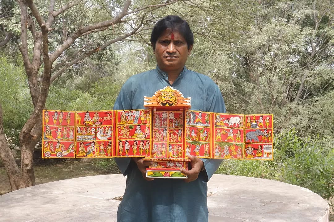 Satyanarayan Suthar with his artwork.  - Satyanrayan Suthar