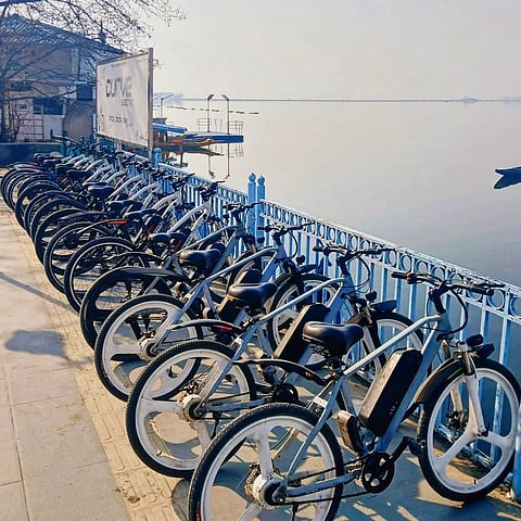 Curve Electric bikes at a docking station