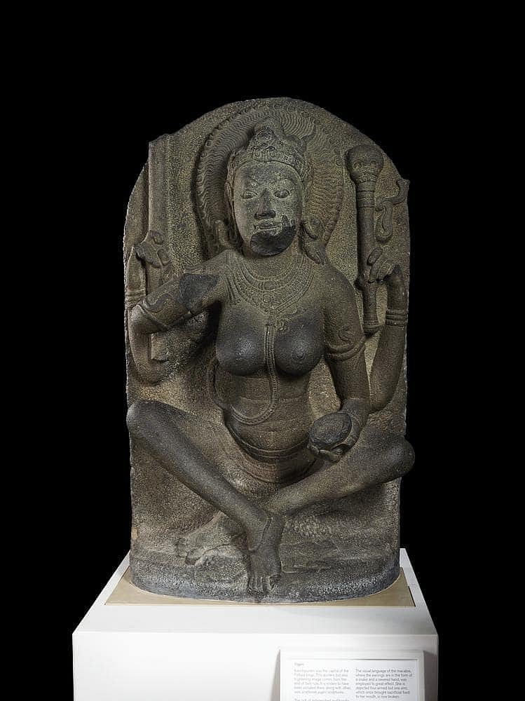 Figure of a mother goddess carrying a skull topped staff and skull cup, now in the British Museum