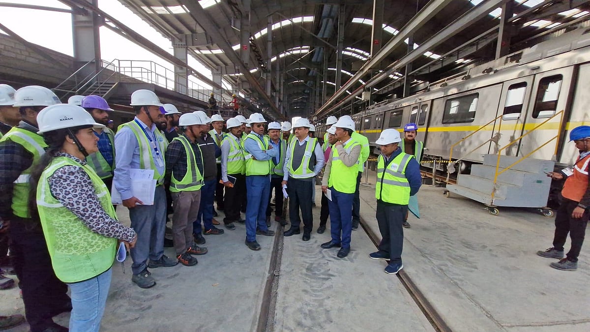 Officials discussing work on the Indore metro service