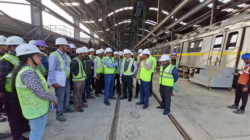 Officials discussing work on the Indore metro service