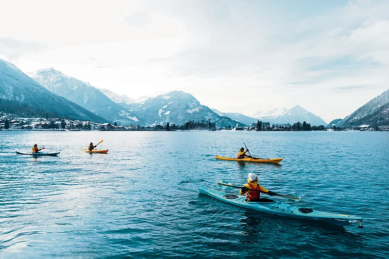 Kayaking across the turquoise expanse of Lake Brienz