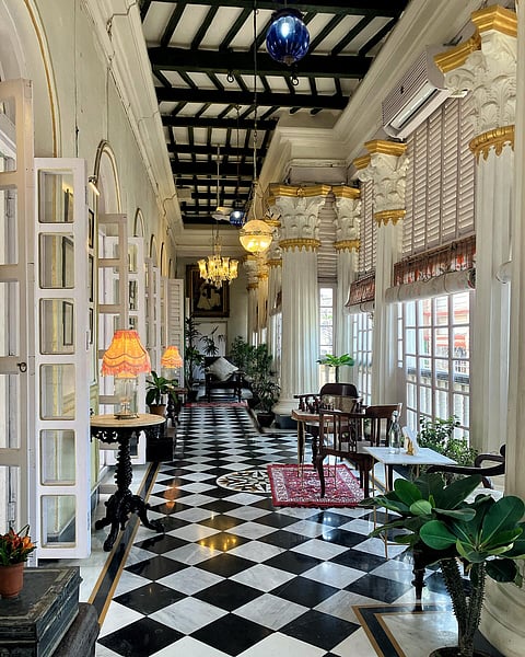 Black and white checkered tiles and stunning marble work at Bari Kothi