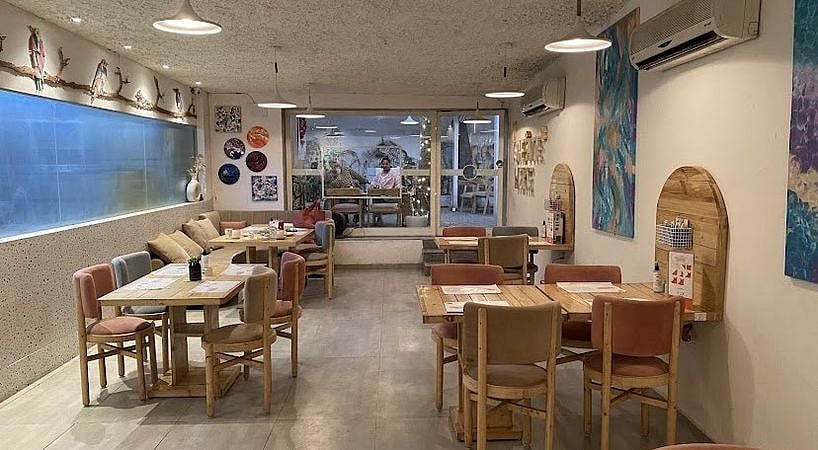 The Palette Cafe in Chhatarpur is a perfect spot for a solo date or unwinding with friends. 