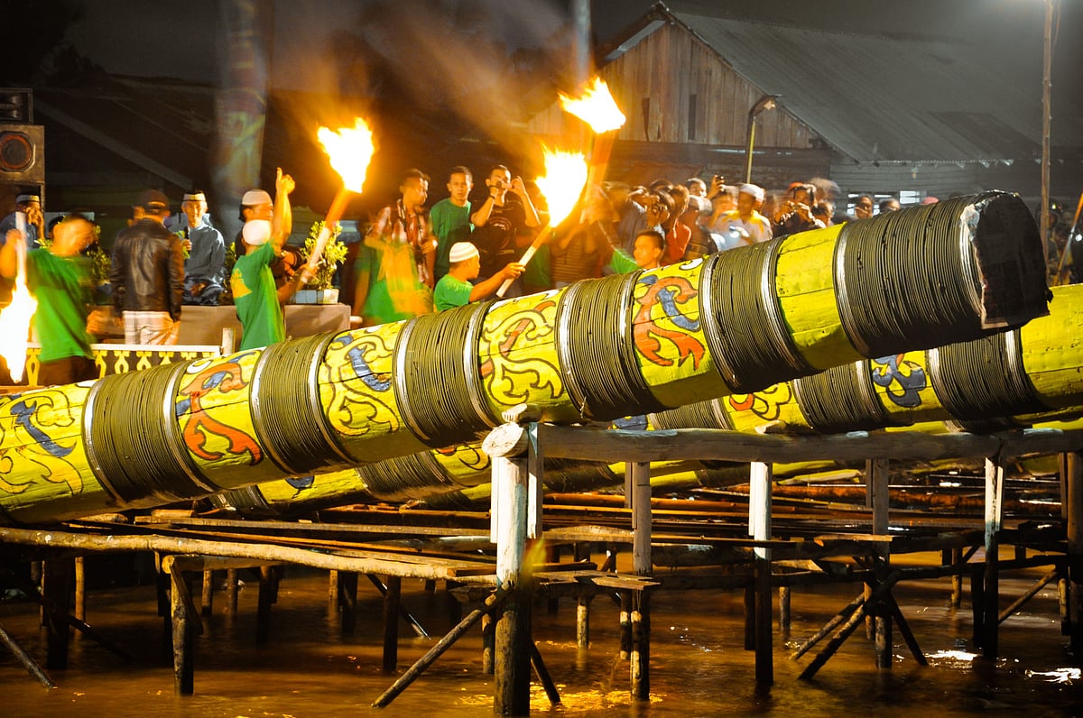 Meriam Karbit refers to a traditional bamboo cannon that is crafted using bamboo tubes and filled with a mixture of kerosene (karbit) and other flammable materials