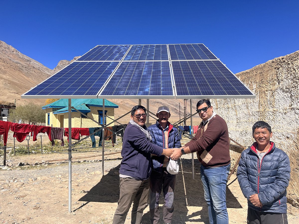 Installing solar lights in a village