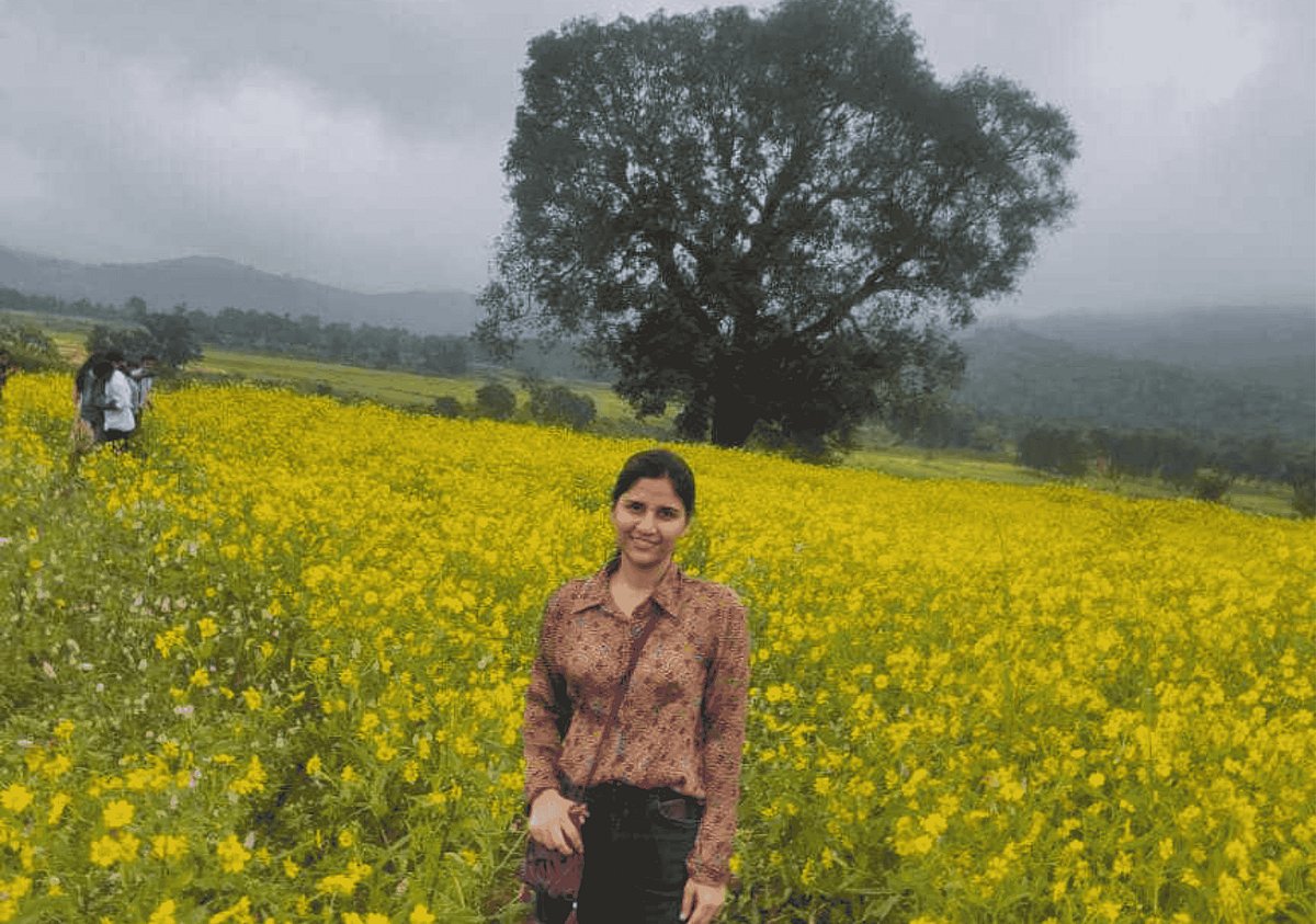 The author strikes a pose at the golden-hued Lambasingi fields.