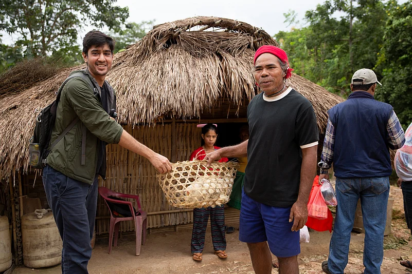 A cooking demonstration in a village near Tura, Meghalaya