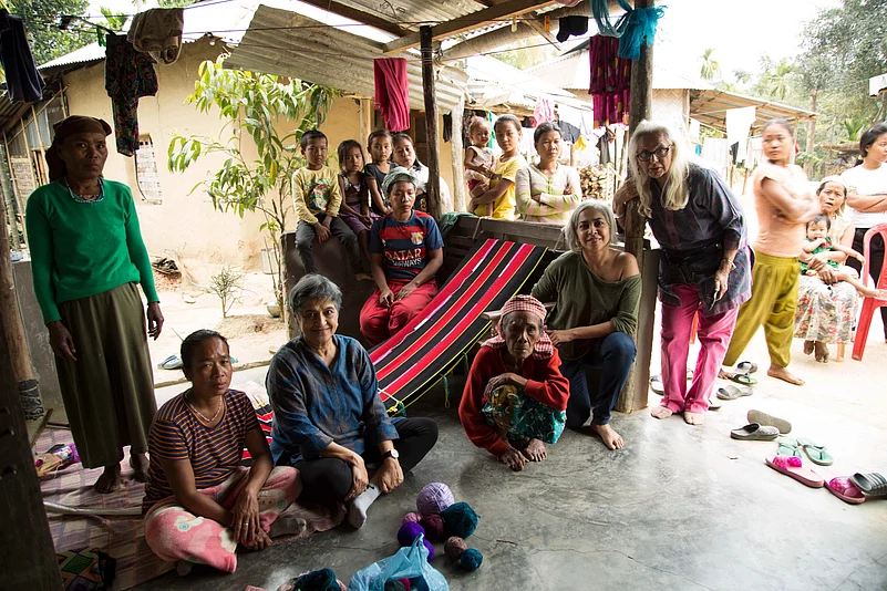 Julie Kagti and guests with weavers from the Darlong tribe of Tripura