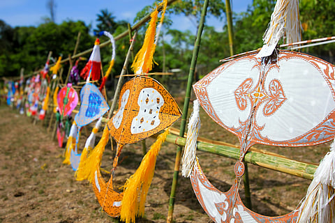 Wau Bulan kites are flown during festivities and are traditional symbols of Malaysia