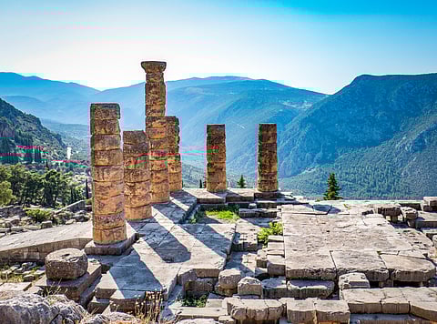 Ruins of the ancient Temple of Apollo at Delphi, overlooking the valley of Phocis