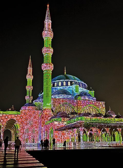 The Sharjah Mosque patterned in a kaleidoscopic display of light and colour