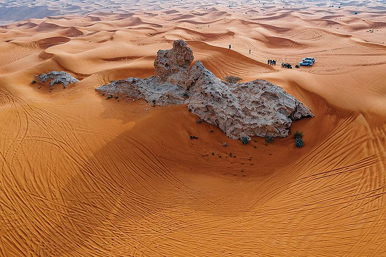 The ochre dunes of Mleiha in Sharjah's Central Region offer desert adventures like dune bashing - SCTDA