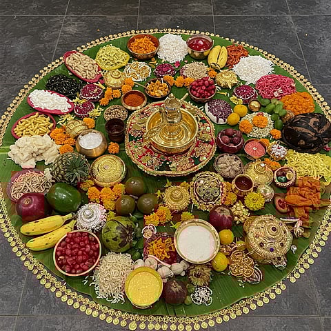 The vishukkanni is a special arrangement of auspicious items such as seasonal fruits, vegetables, flowers, rice, clothes, coins, gold ornaments and more