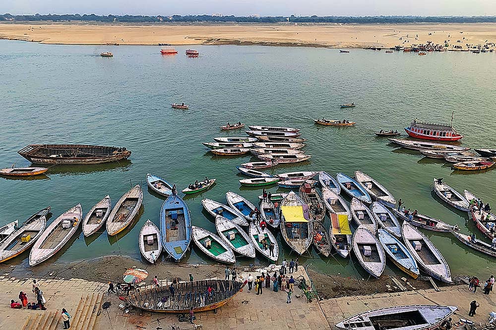 A view of boats tethered along the banks of the Ganga