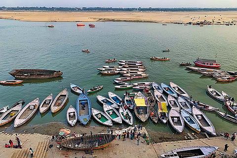 A view of boats tethered along the banks of the Ganga