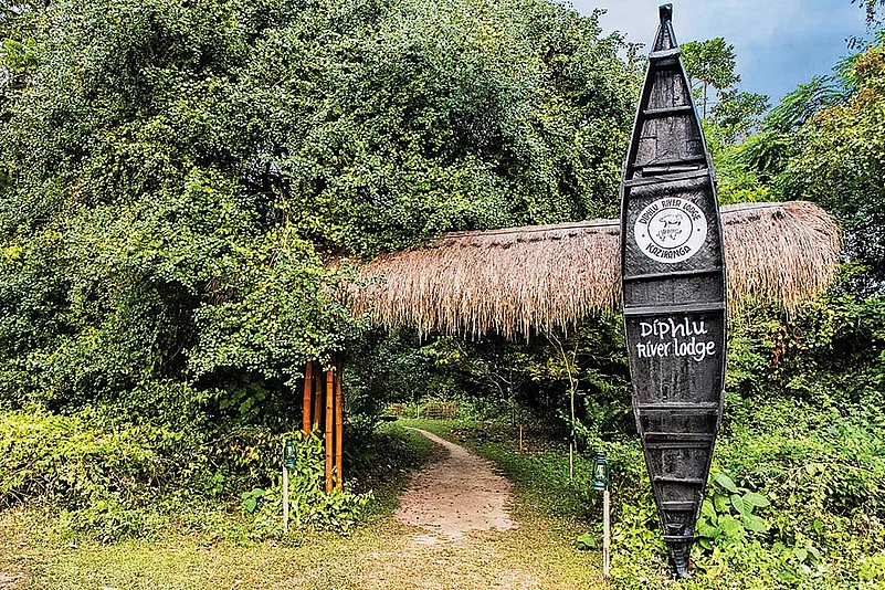 The Diphlu River Lodge is located along three sides of Kaziranga National Parks perimeter